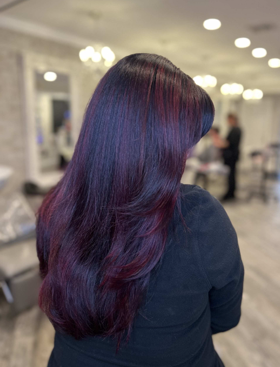 Vivid red hair color specialist in Boston salon