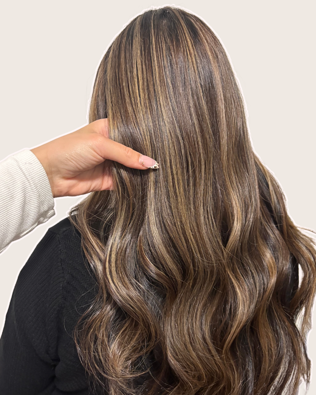 Hairstylist performing a blowout service at Philip Edward Salon in Charlestown Boston